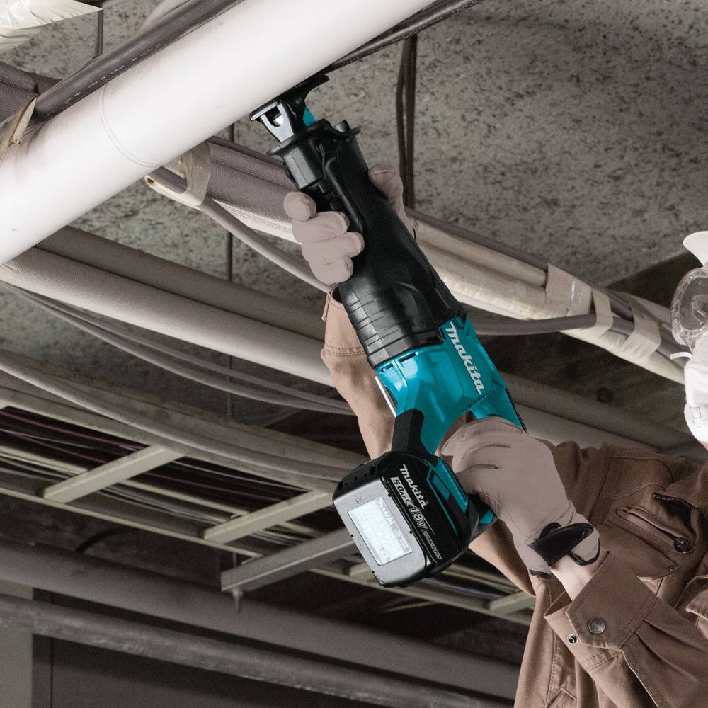 Makita XT707PT 18V LXT Lithium-Ion Brushless Cordless 7-Piece Combination Tool Kit, Featuring XPH14Z, XDT14Z, XRJ05Z, XSH03Z, XAG04Z, XRM06B, DML815, Dual Port Charger, Tool Bag, and 5.0Ah Batteries